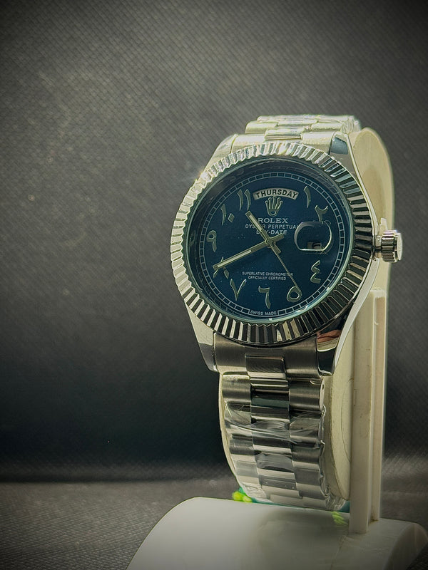 Rolex day date watch.